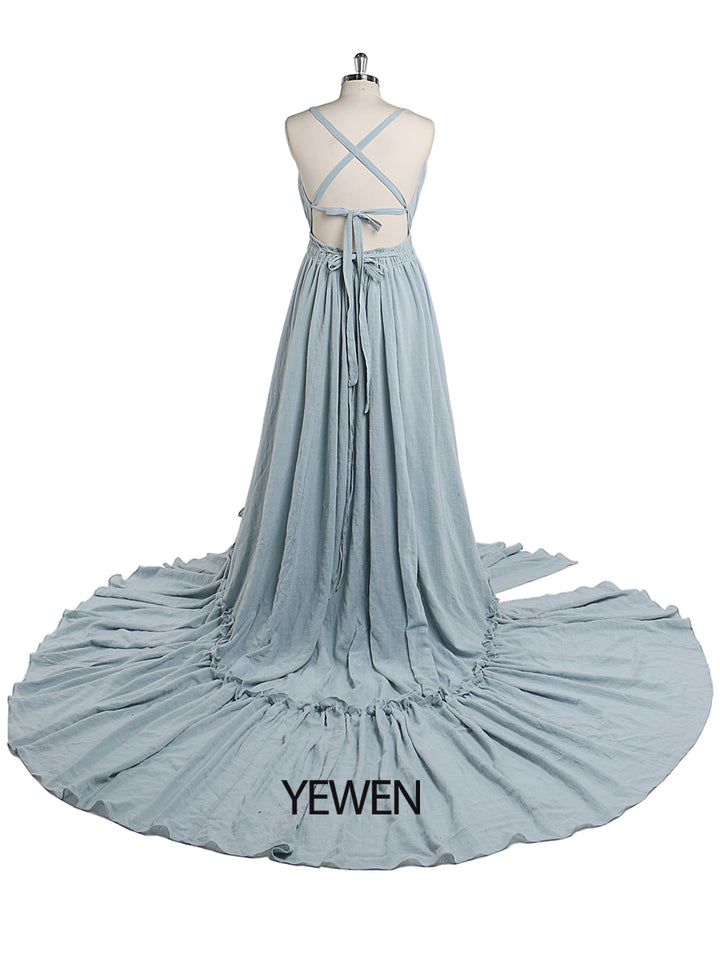 Back view of blue V neck photography dress with stretch waist design for maternity and baby shower photography sessions