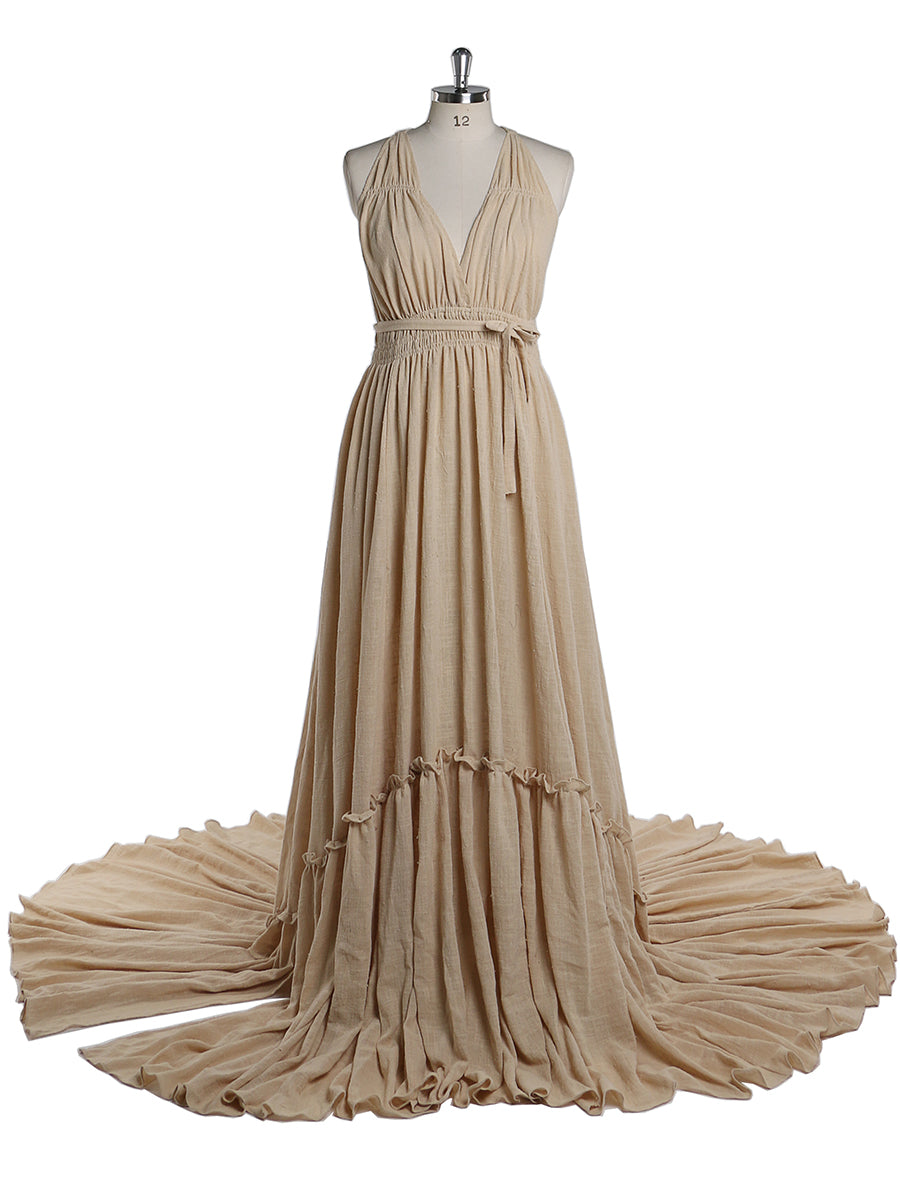 Front view of kahaki V neck photography dress featuring stretch waist design and elegant maternity evening gown silhouette