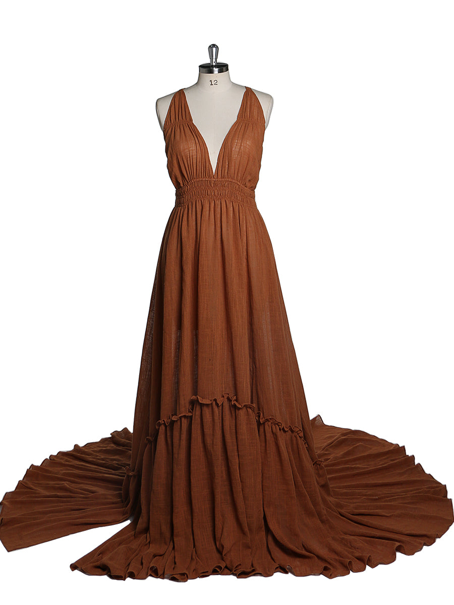 Front view of V neck photography dress featuring stretch waist design and elegant maternity gown silhouette