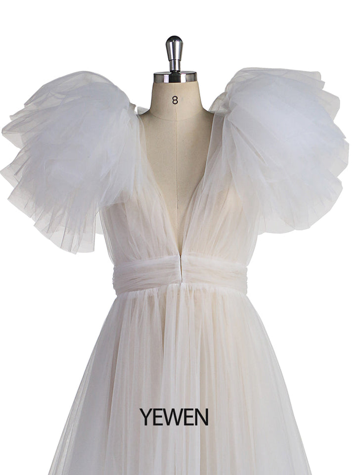 Front view of white maternity dress for photo shoot close up